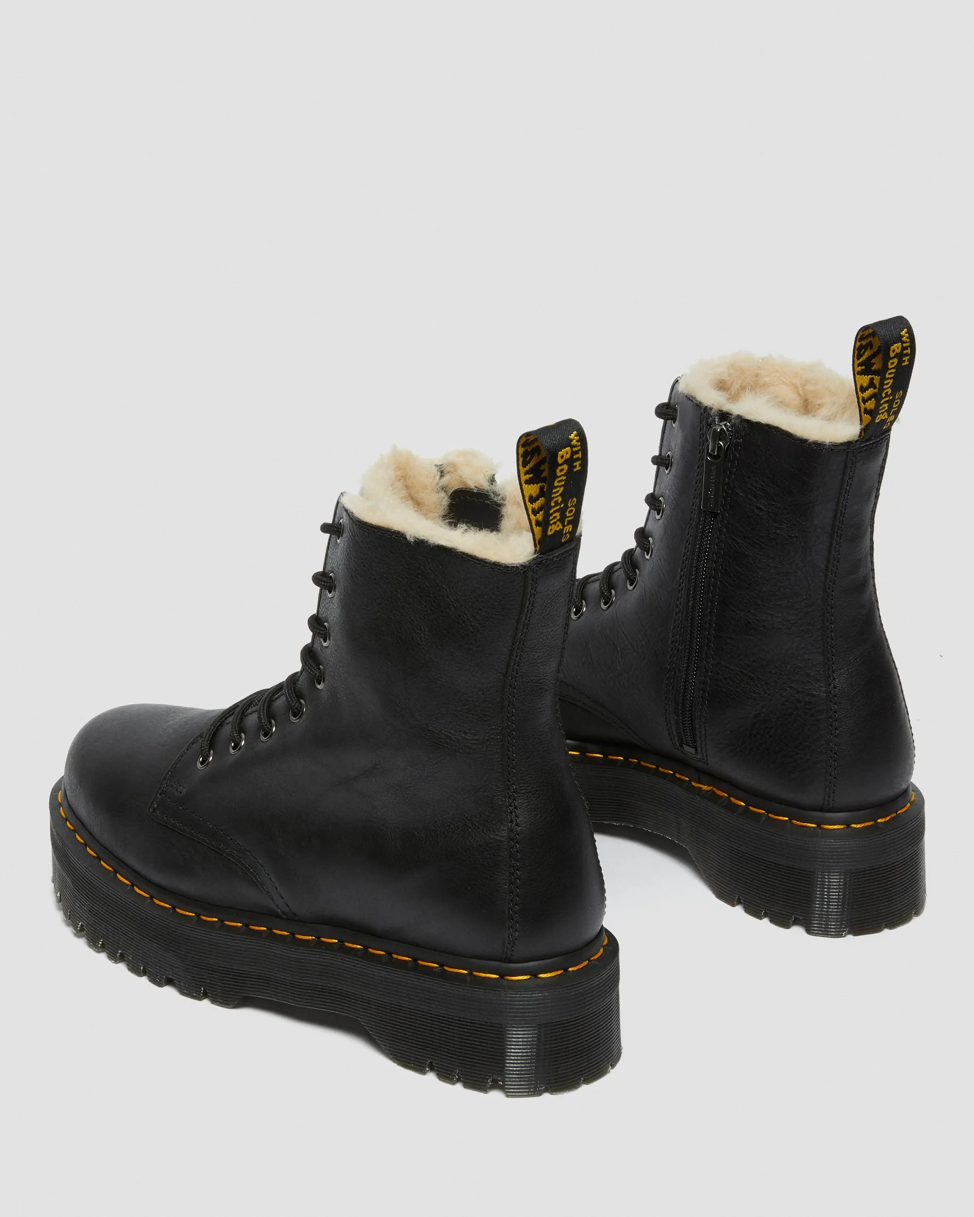 Dr. Jadon leather platform boots with faux fur lining. Martens