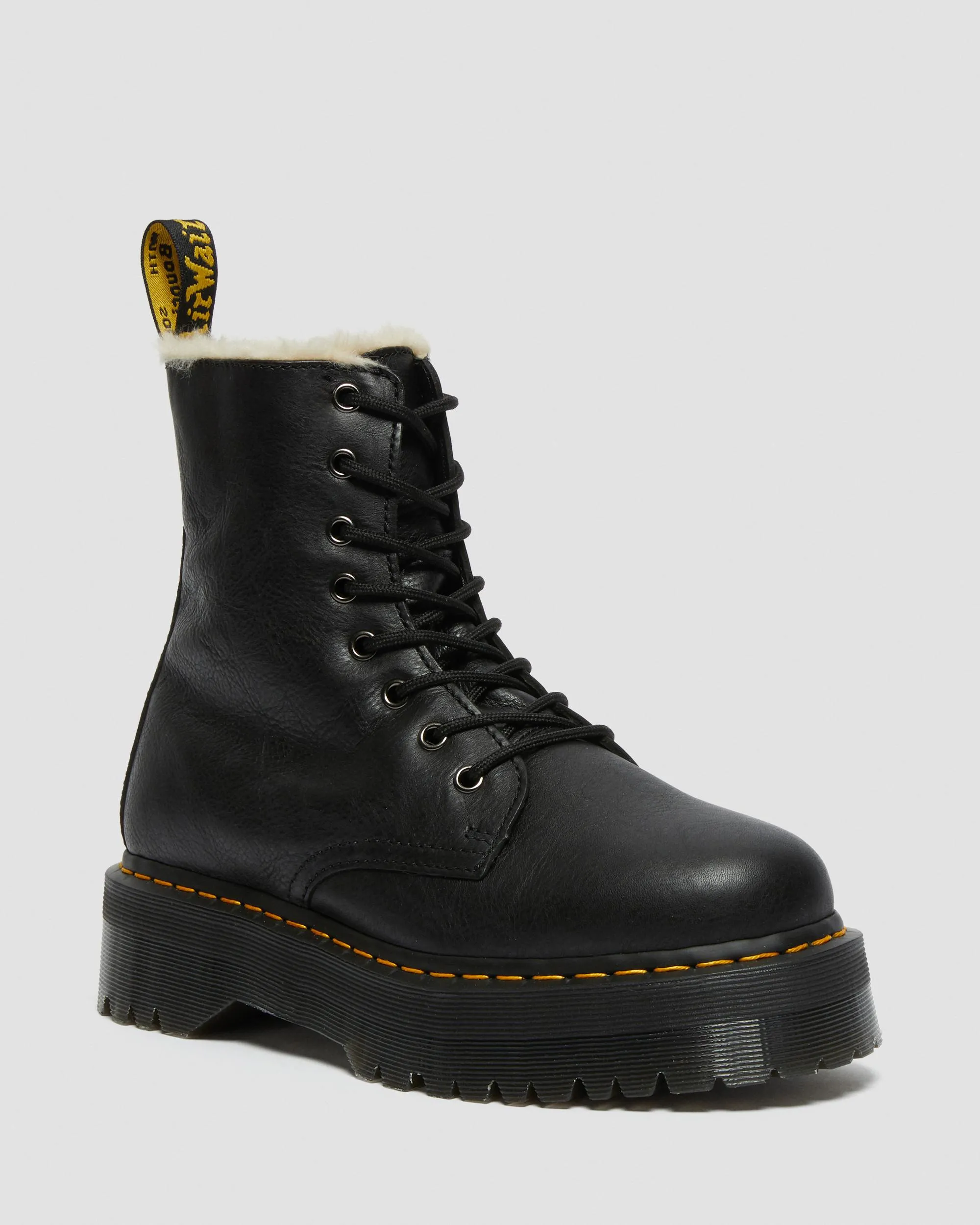 Dr. Jadon leather platform boots with faux fur lining. Martens