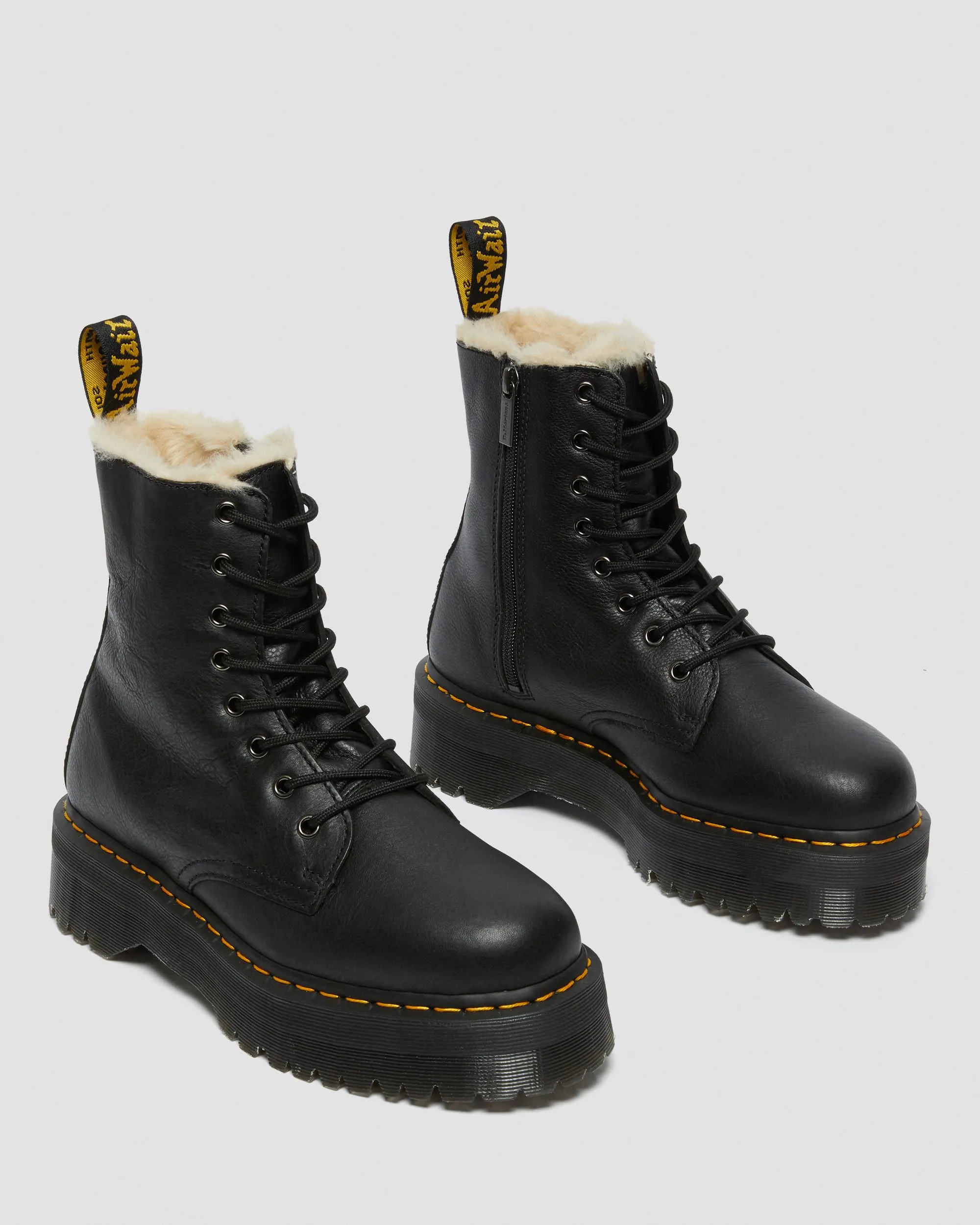 Dr. Jadon leather platform boots with faux fur lining. Martens